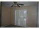 Bedroom with sliding closet doors, a ceiling fan and neutral walls at 1158 Gecko Rd, Henderson, NV 89002