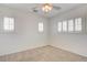 Bedroom with plantation shutters and neutral carpet at 1158 Gecko Rd, Henderson, NV 89002