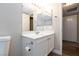 Well-lit bathroom with modern sink, mirror and cabinets at 1201 Sulphur Springs Ln # 101, Las Vegas, NV 89128