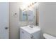 Bathroom vanity with chrome fixtures and a well-lit mirror at 1201 Sulphur Springs Ln # 101, Las Vegas, NV 89128