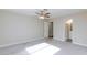 Bright main bedroom with neutral carpet and ensuite bathroom entrance at 1201 Sulphur Springs Ln # 101, Las Vegas, NV 89128