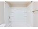 Clean, bright shower tub combo with built-in shelving at 1201 Sulphur Springs Ln # 101, Las Vegas, NV 89128