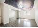 Bright bedroom with gray laminate flooring and a unique ceiling design at 1316 Driscoll Dr # 201, Las Vegas, NV 89128