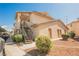 Apartment building exterior featuring well-maintained landscaping at 1316 Driscoll Dr # 201, Las Vegas, NV 89128