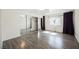 Spacious main bedroom with mirrored closet doors and wood floors at 1316 Driscoll Dr # 201, Las Vegas, NV 89128
