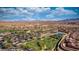 An overview of community tennis courts, putting greens and desert mountain views at 1424 Pin Cushion Rdg, Mesquite, NV 89034