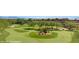Well-manicured golf course with mature landscaping at 1424 Pin Cushion Rdg, Mesquite, NV 89034