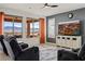 Bright living room boasts mountain views, stylish furniture, and modern entertainment setup at 1424 Pin Cushion Rdg, Mesquite, NV 89034