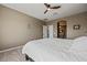 Comfortable main bedroom with an ensuite bathroom and modern light woodgrain vinyl flooring at 1424 Pin Cushion Rdg, Mesquite, NV 89034
