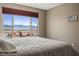 Lovely mountain views from the main bedroom window with complementary window treatment at 1424 Pin Cushion Rdg, Mesquite, NV 89034
