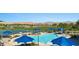Resort-style pool with lounge chairs and golf course views at 1424 Pin Cushion Rdg, Mesquite, NV 89034
