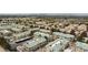 Wide aerial view showcases the neighborhood layout, lush greenery, and consistent architectural design at 1509 Linnbaker Ln # 203, Las Vegas, NV 89110
