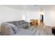 Comfortable living room featuring a large sofa and views into other rooms at 1509 Linnbaker Ln # 203, Las Vegas, NV 89110