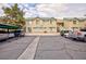 A parking lot is in front of the residential building with multiple cars parked at 1509 Linnbaker Ln # 203, Las Vegas, NV 89110
