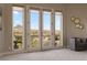 Balcony view from the primary bedroom featuring mountain views and outdoor seating at 17 Grand Corniche Dr, Henderson, NV 89011