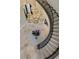 Aerial view of grand foyer with spiral staircase and stunning chandelier at 17 Grand Corniche Dr, Henderson, NV 89011