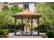 Charming gazebo surrounded by lush greenery and a decorative fountain at 17 Grand Corniche Dr, Henderson, NV 89011