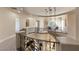 Second floor landing with wrought iron railing and decorative chandelier at 17 Grand Corniche Dr, Henderson, NV 89011