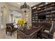 Executive office features custom built-ins, decorative chandelier, and elegant furnishings at 17 Grand Corniche Dr, Henderson, NV 89011