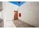 Private back patio with a door and a small window at 1800 Edmond St # 115, Las Vegas, NV 89146