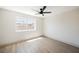Bright bedroom with a large window and hardwood floors at 1800 Edmond St # 115, Las Vegas, NV 89146