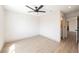 Spacious bedroom with hardwood floors leads to ensuite bathroom at 1800 Edmond St # 115, Las Vegas, NV 89146