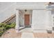 Front entrance featuring a covered porch and manicured landscaping at 1800 Edmond St # 115, Las Vegas, NV 89146