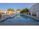 Relaxing community pool with clear blue water and accessible features under a bright sky at 1800 Edmond St # 115, Las Vegas, NV 89146