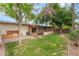 The property features a spacious backyard and lush lawn, providing ample space for outdoor activities at 1904 Fontenelle St, Las Vegas, NV 89102