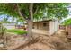 Mature trees and a lush lawn define the backyard, enhancing the outdoor living experience at 1904 Fontenelle St, Las Vegas, NV 89102
