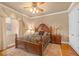 Cozy bedroom with a large bed and wood floors at 20 Via Mantova # 306, Henderson, NV 89011
