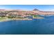 Beautiful lakefront community showcasing serene water, lush greenery, and luxury resort living at 20 Via Mantova # 306, Henderson, NV 89011