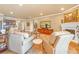Spacious living room with fireplace and lake views at 20 Via Mantova # 306, Henderson, NV 89011
