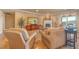 Elegant living room with comfortable seating, a fireplace, and scenic views at 20 Via Mantova # 306, Henderson, NV 89011