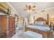 Spacious main bedroom featuring elegant furniture and decor at 20 Via Mantova # 306, Henderson, NV 89011