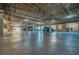 Well lit parking garage with dedicated spaces for residents and visitors at 20 Via Mantova # 306, Henderson, NV 89011