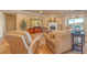 Comfortable living room with a fireplace, TV, and elegant furniture at 20 Via Mantova # 306, Henderson, NV 89011