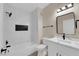 Well-lit bathroom with modern shower and vanity with new fixtures at 2007 Cutlass Dr # 0, Henderson, NV 89014