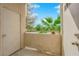 Outdoor patio with a view of trees and a closed door at 2007 Cutlass Dr # 0, Henderson, NV 89014