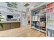 Open hallway with hardwood floors, shelving units, and storage leading to living area at 224 Silver Castle St, Las Vegas, NV 89144