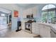 Well-lit kitchen featuring stainless steel appliances, white cabinets, and lots of natural light at 224 Silver Castle St, Las Vegas, NV 89144