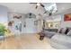 Spacious living room with vaulted ceilings, skylight, and wood-look flooring at 224 Silver Castle St, Las Vegas, NV 89144