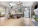 Open living room with hardwood floors, fireplace, vaulted ceilings and plenty of natural light at 224 Silver Castle St, Las Vegas, NV 89144