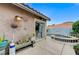 Back patio features decor, access to hot tub, and tile roofing at 224 Silver Castle St, Las Vegas, NV 89144