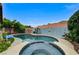 Inviting backyard pool and spa with a clear blue sky above, perfect for relaxing or entertaining guests at 224 Silver Castle St, Las Vegas, NV 89144