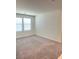 Neutral bedroom with carpet flooring and natural light at 2444 Padulle Pl, Henderson, NV 89044