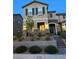 Charming two-story home with well-manicured landscaping and inviting entrance at 2444 Padulle Pl, Henderson, NV 89044