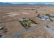 Aerial view showcasing the home with pool and a spacious lot in a rural setting at 2500 S Zephyr Ave, Pahrump, NV 89048