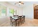 Cozy dining room with tile flooring, traditional-style dining table, and natural light at 2500 S Zephyr Ave, Pahrump, NV 89048