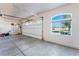 An oversized, well-lit three-car garage features storage and an insulated door at 2500 S Zephyr Ave, Pahrump, NV 89048